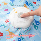 Pressing the paw print button to turn on the automatic interactive cat toy