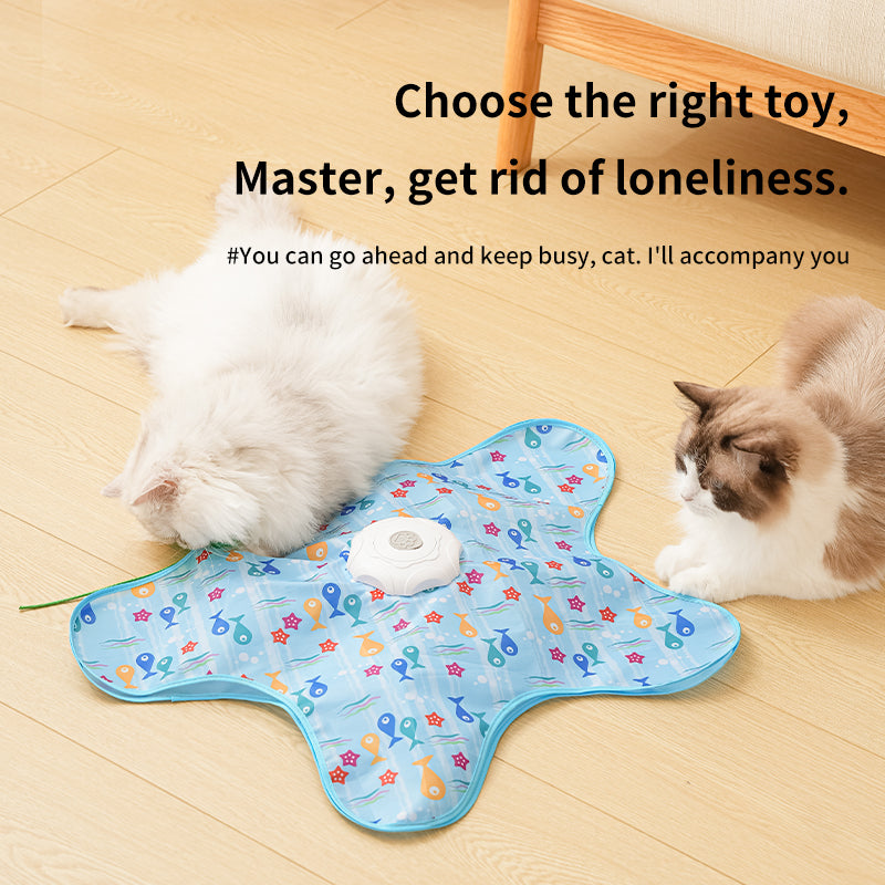 Two cats entertained by the automatic rotating feather wand cat toy on a wooden floor